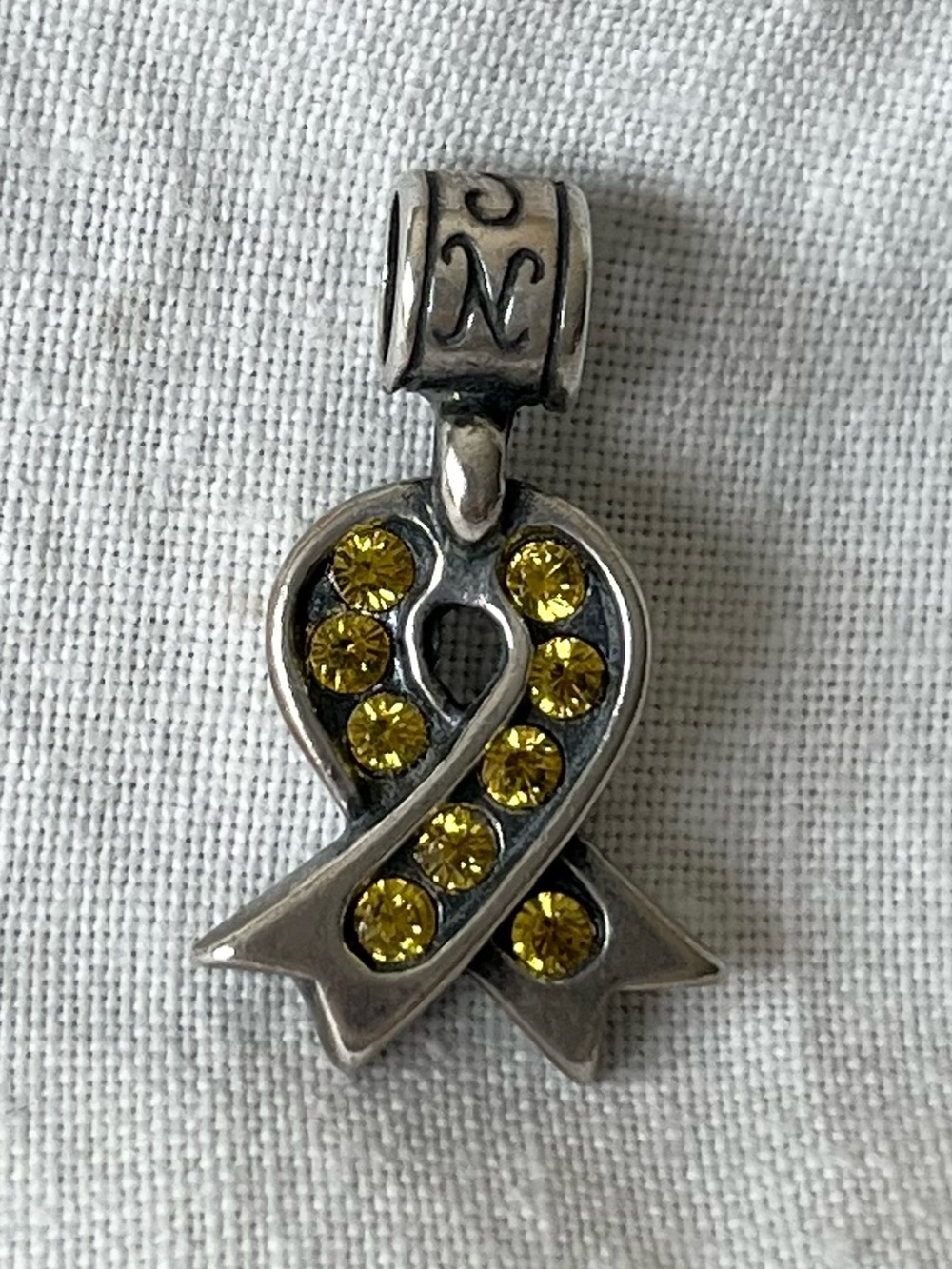 Nomades .925 sterling silver Yellow Ribbon Charm